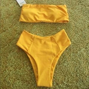 Yellow bikini w/ tags, brand new.